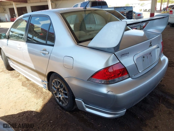 2005 Mitsubishi Lancer ES with VIN JA3AJ26E55U009131, listed as a IAAI auction lot 41980014 with 227,805 mi miles. Bid and sale history available at carsss.com. Image 3.