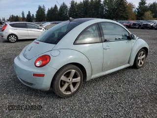 2010 Volkswagen New Beetle Coupe with VIN 3VWRG3AG6AM026310, listed as a Copart auction lot 79057794 with 106,721 mi miles and Salvage Title. Bid and sale history available at carsss.com. Image 3.