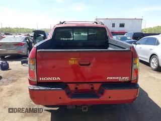 2006 Honda Ridgeline RTL with VIN 2HJYK16566H506602, listed as a IAAI auction lot 42098233 with 236,804 mi miles. Bid and sale history available at carsss.com. Image 16.