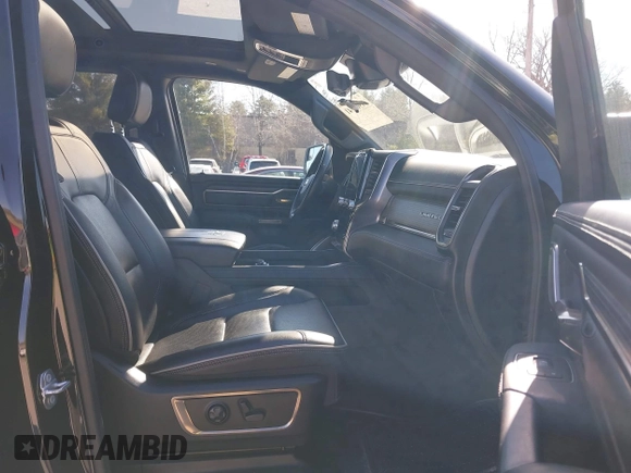 2021 Ram 1500 Limited with VIN 1C6SRFHT2MN564183, listed as a IAAI auction lot 41965741 with 48,993 mi miles and . Bid and sale history available at DreamBid. Image 5.