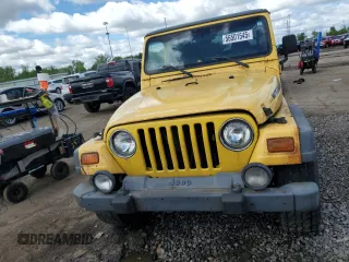 2001 Jeep Wrangler Sport z VIN 1J4FA49S01P355451, wystawiony jako Copart lot #56501545 z przebiegiem 213 027 mil mil oraz Czysty tytuł • Clean title. Historia ofert i sprzedaży dostępna na DreamBid. Obrazek 5.