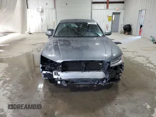2015 Audi A8 z VIN WAUJGAFDXFN008499, wystawiony jako Copart lot #87658385 z przebiegiem 103 175 mil mil oraz Szkoda całkowita • Salvage title. Historia ofert i sprzedaży dostępna na DreamBid. Obrazek 5.