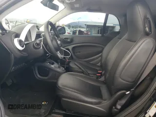 2016 Smart fortwo Passion z VIN WMEFJ5DAXGK069026, wystawiony jako Copart lot #53535045 z przebiegiem 34 410 mil mil oraz Tytuł czysty. Historia ofert i sprzedaży dostępna na DreamBid. Obrazek 7.