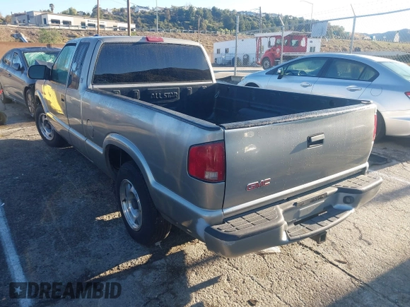 2001 GMC Sonoma SLS 1SG z VIN 1GTCS19W818237097, wystawiony jako IAAI lot #41745396 z przebiegiem Nie podano mil oraz . Historia ofert i sprzedaży dostępna na DreamBid. Obrazek 3.