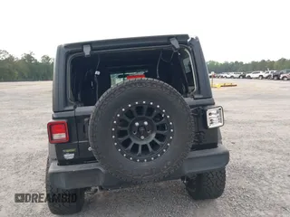 2021 Jeep Wrangler Unlimited Willys z VIN 1C4HJXDM5MW859724, wystawiony jako IAAI lot #42311203 z przebiegiem 71 887 mil mil oraz . Historia ofert i sprzedaży dostępna na DreamBid. Obrazek 16.