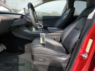 2021 Tesla Model Y Standard Range with VIN 5YJYGDED3MF107259, listed as a Copart auction lot 48566935 with 68,561 mi miles and Salvage Title. Bid and sale history available at carsss.com. Image 7.