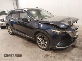2016 Mazda CX-9 Grand Touring with VIN JM3TCBDY9G0109770, listed as a IAAI auction lot 41551085 with 131,812 mi miles. Bid and sale history available at carsss.com. Image 1.