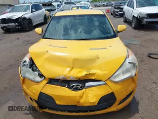 2012 Hyundai Veloster w/Black Int with VIN KMHTC6AD5CU046702, listed as a IAAI auction lot 42245379 with 136,327 mi miles and . Bid and sale history available at DreamBid. Image 6.