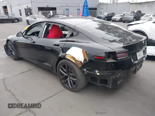 2022 Tesla Model S with VIN 5YJSA1E55NF474342, listed as a IAAI auction lot 41870994 with 33,804 mi miles and . Bid and sale history available at DreamBid. Image 3.