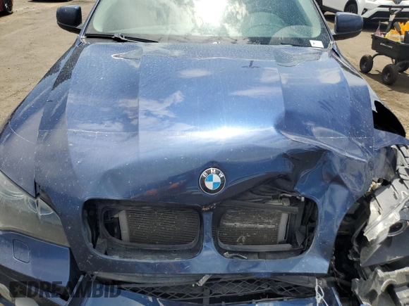 2011 BMW X6 50i with VIN 5UXFG8C51BLZ95772, listed as a Copart auction lot 65733764 with 94,467 mi miles and Salvage Title. Bid and sale history available at carsss.com. Image 12.
