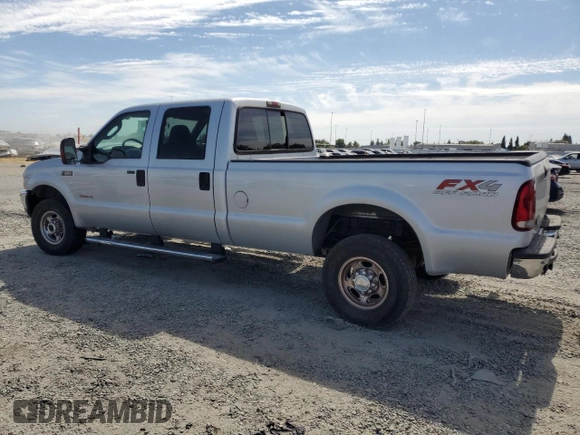 2004 Ford F-350 XL with VIN 1FTSW31P04EC44129, listed as a Copart auction lot 63519165 with 205,411 mi miles and Salvage title. Bid and sale history available at DreamBid. Image 2.