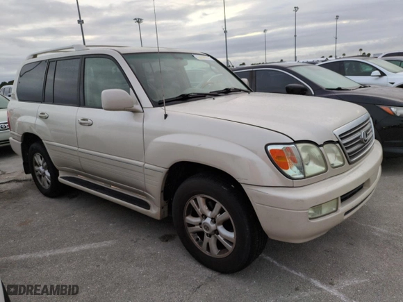2004 Lexus LX 470 with VIN JTJHT00W243543558, listed as a Copart auction lot 74859974 with 189,556 mi miles and Salvage Title. Bid and sale history available at carsss.com. Image 4.