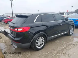 2016 Lincoln MKX Select with VIN 2LMTJ6KRXGBL50561, listed as a IAAI auction lot 41941507 with 81,230 mi miles. Bid and sale history available at carsss.com. Image 4.