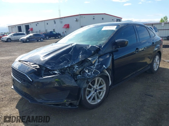 2018 Ford Focus SE z VIN 1FADP3F20JL288437, wystawiony jako IAAI lot #42278885 z przebiegiem 132 504 mil mil oraz . Historia ofert i sprzedaży dostępna na DreamBid. Obrazek 17.