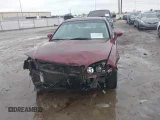 2003 Hyundai XG with VIN KMHFU45E43A257473, listed as a IAAI auction lot 41385881 with 184,165 mi miles. Bid and sale history available at carsss.com. Image 6.