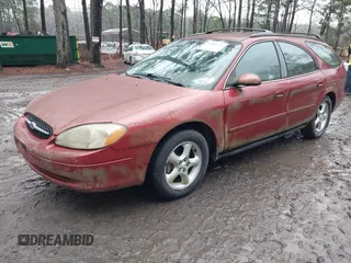 2001 Ford Taurus SE Standard with VIN 1FAFP58U91A290623, listed as a IAAI auction lot 41503243 with 117,194 mi miles and . Bid and sale history available at DreamBid. Image 2.