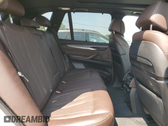 2014 BMW X5 xDrive50i z VIN 5UXKR6C54E0J71803, wystawiony jako Copart lot #60000295 z przebiegiem 130 769 mil mil oraz Czysty tytuł • Clean title. Historia ofert i sprzedaży dostępna na DreamBid. Obrazek 11.