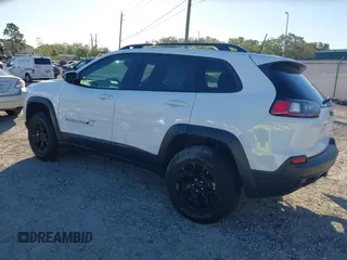 2022 Jeep Cherokee X with VIN 1C4PJMCX2ND533284, listed as a IAAI auction lot 41827335 with 19,404 mi miles. Bid and sale history available at carsss.com. Image 3.