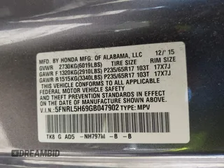 2016 Honda Odyssey EX-L with VIN 5FNRL5H69GB047902, listed as a IAAI auction lot 40795564 with 124,788 mi miles. Bid and sale history available at carsss.com. Image 9.