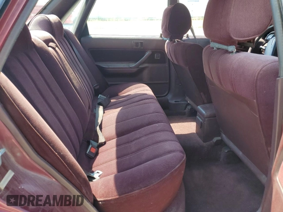 1991 Toyota Camry DLX z VIN 4T1SV21E4MU332100, wystawiony jako Copart lot #64645474 z przebiegiem 164 143 mil mil oraz Czysty tytuł • Clean title. Historia ofert i sprzedaży dostępna na DreamBid. Obrazek 10.