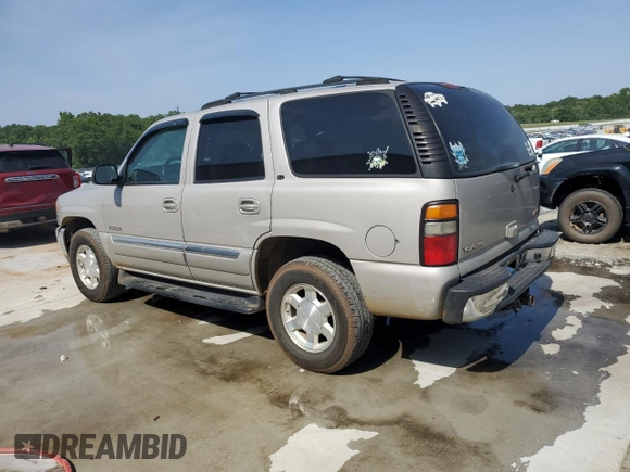 2005 GMC Yukon SLE z VIN 1GKEC13T75J179930, wystawiony jako Copart lot #57259205 z przebiegiem 310 454 mil mil oraz Szkoda całkowita • Salvage title. Historia ofert i sprzedaży dostępna na DreamBid. Obrazek 2.