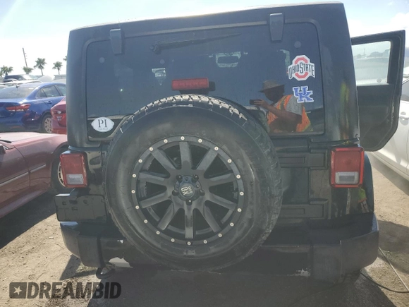 2014 Jeep Wrangler Sahara with VIN 1C4AJWBG3EL258582, listed as a Copart auction lot 74921604 with 17,777 mi miles and Non Repairable. Bid and sale history available at DreamBid. Image 6.