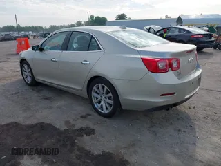 2013 Chevrolet Malibu LTZ with VIN 1G11H5SA5DF259174, listed as a IAAI auction lot 42145891 with 158,959 mi miles and . Bid and sale history available at DreamBid. Image 3.
