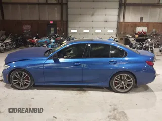 2021 BMW 3 Series M340i with VIN 3MW5U7J03M8B49500, listed as a IAAI auction lot 41018975 with 77,471 mi miles. Bid and sale history available at carsss.com. Image 14.