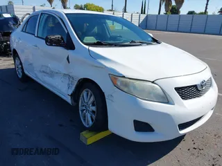 2009 Toyota Corolla with VIN 1NXBU40E69Z114716, listed as a IAAI auction lot 42228323 with 205,098 mi miles and . Bid and sale history available at DreamBid. Image 1.