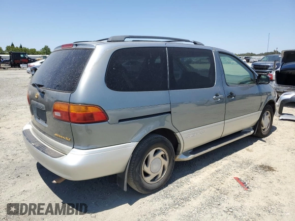 1998 Toyota Sienna LE with VIN 4T3ZF13C4WU064791, listed as a Copart auction lot 61411865 with 218,835 mi miles and Salvage title. Bid and sale history available at DreamBid. Image 3.