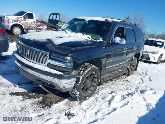 2002 Chevrolet Tahoe LT with VIN 1GNEK13Z62J281810, listed as a IAAI auction lot 41373655 with 161,157 mi miles. Bid and sale history available at carsss.com. Image 2.
