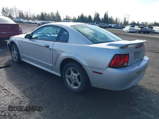 2003 Ford Mustang Standard with VIN 1FAFP40413F312108, listed as a IAAI auction lot 41954137 with 90,415 mi miles. Bid and sale history available at carsss.com. Image 3.