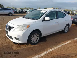 2014 Nissan Versa S Plus with VIN 3N1CN7AP1EL843379, listed as a IAAI auction lot 41905567 with 125,293 mi miles. Bid and sale history available at carsss.com. Image 2.