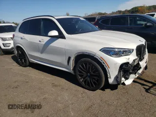 2020 BMW X5 M50i with VIN 5UXJU4C06L9C45320, listed as a Copart auction lot 74911604 with 78,465 mi miles and Salvage Title. Bid and sale history available at carsss.com. Image 4.