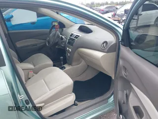 2010 Toyota Yaris with VIN JTDBT4K32A4070723, listed as a IAAI auction lot 42011968 with 71,950 mi miles and . Bid and sale history available at carsss.com. Image 5.