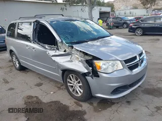 2016 Dodge Grand Caravan SXT with VIN 2C4RDGCG9GR180396, listed as a IAAI auction lot 41921312 with 130,256 mi miles and . Bid and sale history available at DreamBid. Image 1.