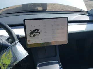 2023 Tesla Model Y Long Range with VIN 7SAYGDEE6PF912074, listed as a IAAI auction lot 41761834 with 18,250 mi miles. Bid and sale history available at carsss.com. Image 18.