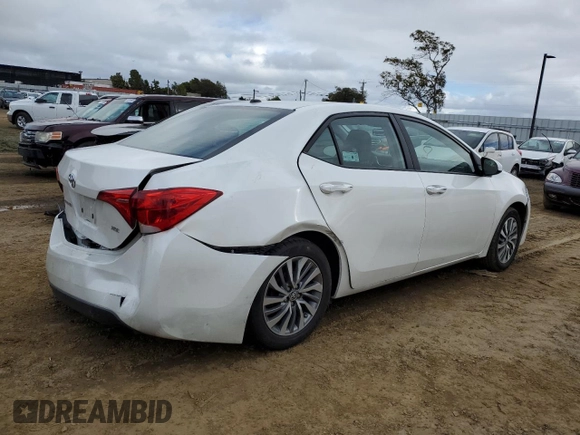 2019 Toyota Corolla L with VIN 5YFBURHE5KP891705, listed as a Copart auction lot 49501905 with 67,403 mi miles and Salvage Title. Bid and sale history available at DreamBid. Image 3.