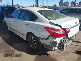 2016 Nissan Altima SV with VIN 1N4AL3APXGC193085, listed as a IAAI auction lot 41507049 with 105,058 mi miles and . Bid and sale history available at DreamBid. Image 3.