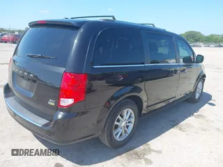 2019 Dodge Grand Caravan SXT with VIN 2C4RDGCG5KR739144, listed as a IAAI auction lot 42175888 with 43,577 mi miles and . Bid and sale history available at DreamBid. Image 4.