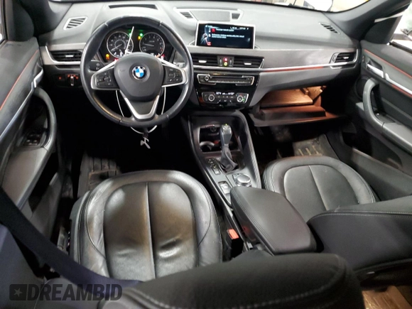 2017 BMW X1 xDrive28i with VIN WBXHT3Z38H4A53824, listed as a Copart auction lot 52500215 with 106,782 mi miles and Salvage title. Bid and sale history available at DreamBid. Image 8.