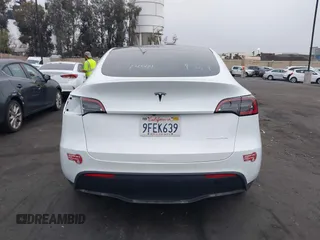 2023 Tesla Model Y Long Range z VIN 7SAYGDEE5PA063097, wystawiony jako IAAI lot #42171871 z przebiegiem Nie podano mil oraz . Historia ofert i sprzedaży dostępna na DreamBid. Obrazek 17.