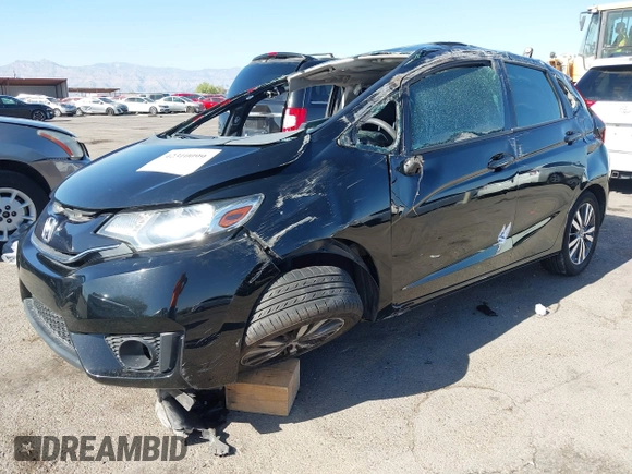 2015 Honda Fit EX-L z VIN 3HGGK5H81FM705199, wystawiony jako IAAI lot #42310099 z przebiegiem Nie podano mil oraz . Historia ofert i sprzedaży dostępna na DreamBid. Obrazek 17.