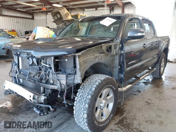 2013 Toyota Tacoma with VIN 3TMLU4EN7DM121253, listed as a IAAI auction lot 42498187 with 145,604 mi miles and . Bid and sale history available at DreamBid. Image 2.