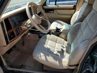 1993 Jeep Cherokee Country with VIN 1J4FJ78S4PL517648, listed as a Copart auction lot 72383564 with 127,156 mi miles and Salvage Title. Bid and sale history available at carsss.com. Image 7.