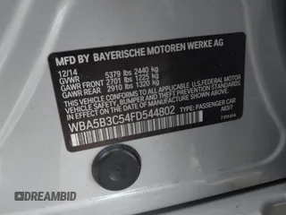 2015 BMW 5 Series 535i xDrive with VIN WBA5B3C54FD544802, listed as a IAAI auction lot 41283822 with 93,828 mi miles. Bid and sale history available at carsss.com. Image 9.