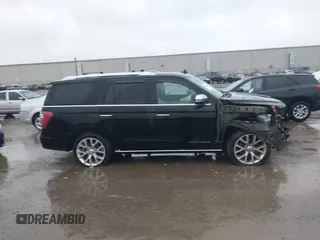 2018 Ford Expedition Platinum with VIN 1FMJU1MT2JEA16459, listed as a IAAI auction lot 40856863 with 125,434 mi miles. Bid and sale history available at carsss.com. Image 13.