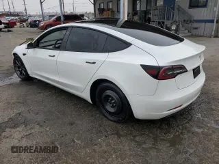 2023 Tesla Model 3 с VIN 5YJ3E1EAXPF574333, выставлен на аукционе Copart как лот 60702975 с пробегом 28 824 миль миль и Списание • Salvage title. История ставок и продаж доступна на DreamBid. Изображение 2.