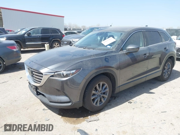 2021 Mazda CX-9 Touring with VIN JM3TCACY2M0502016, listed as a IAAI auction lot 41825456 with 86,068 mi miles. Bid and sale history available at carsss.com. Image 2.
