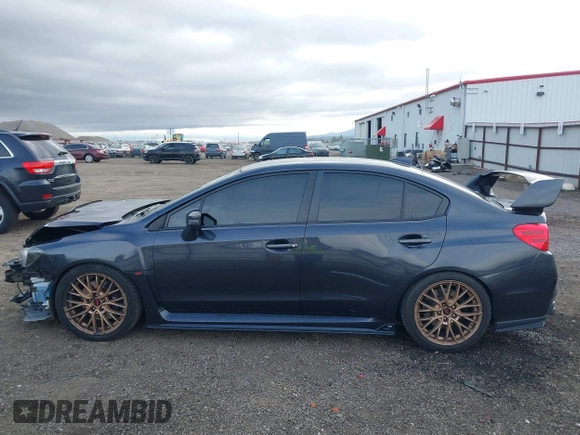 2016 Subaru WRX STI z VIN JF1VA2V65G9819805, wystawiony jako IAAI lot #41894754 z przebiegiem 54 722 mil mil oraz . Historia ofert i sprzedaży dostępna na DreamBid. Obrazek 15.